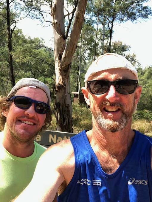 Tony Cox (left) and Ben Wilson last week completed a run from Canberra to Moruya, coming through our district, in two days. Photo supplied