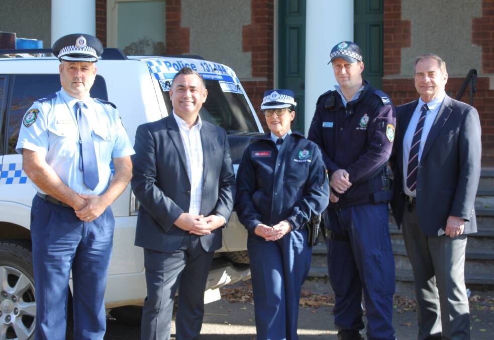 John Barilaro MP and mayor Tim Overall with (L-R) Supt Paul Condon, Insp Sandy Green and Snr Constable Hayden Govers on Monday.