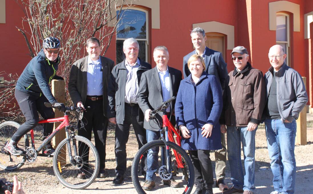 (L-R) Keith Bender, Dennis Puniard, Kevin Phillips, Mick Veitch MLC, Jacinta Handley, Bryce Wilson, Bill Taylor and Innes Fenton at the Rail Trail announcement on Friday, at Bungendore Railway Station.