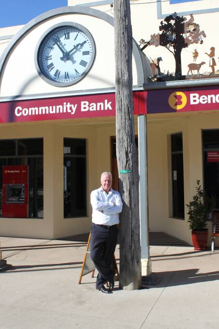 Nick Fry in front of the bank and the Baby Ben clock.