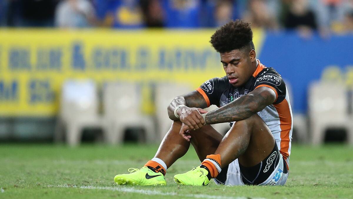 The Tigers' Kevin Naiqama looks dejected after Parramatta surged to victory at ANZ Stadium. Photo: Getty Images