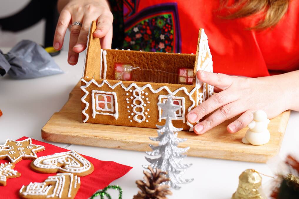 Construction tip: Make sure your royal icing is thick enough to support your house. Photo: Shutterstock