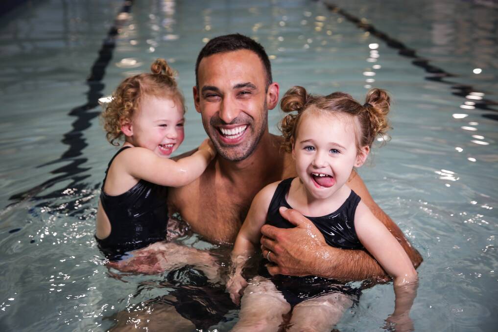 More than a lesson: Swimming offers dads, such as Adam Dovile, the perfect opportunity for quality time in winter