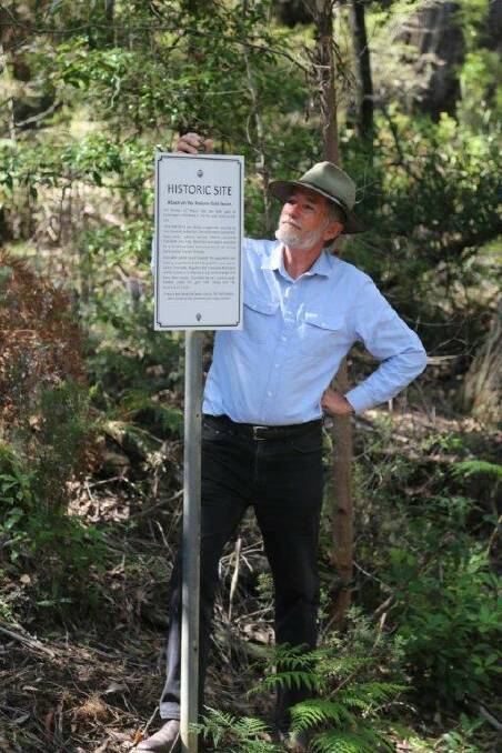 Peter Smith from the Braidwood Historical Society at the marked site on the Araluen to Majors Creek road.