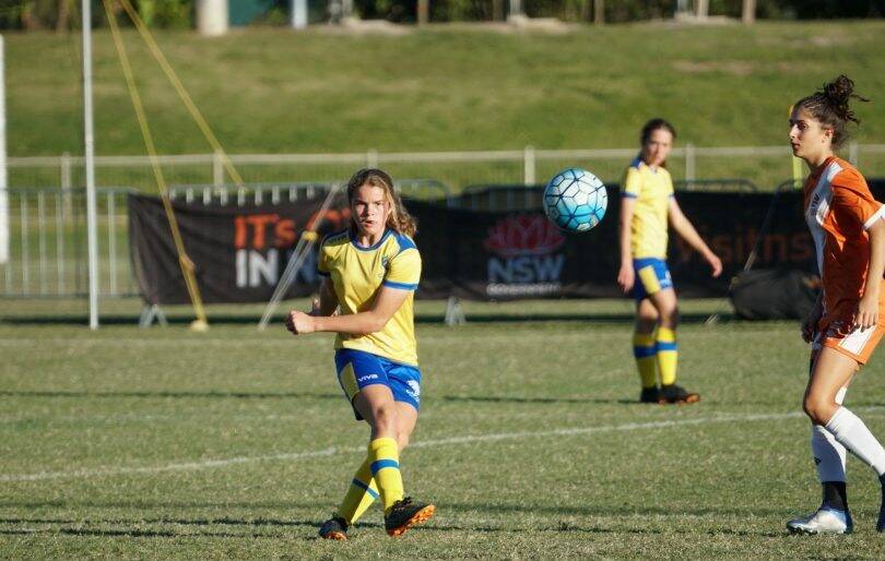 KICK: Isabella Hindmarsh representing the ACT against the Northern Territory in July 2019. Photo: supplied
