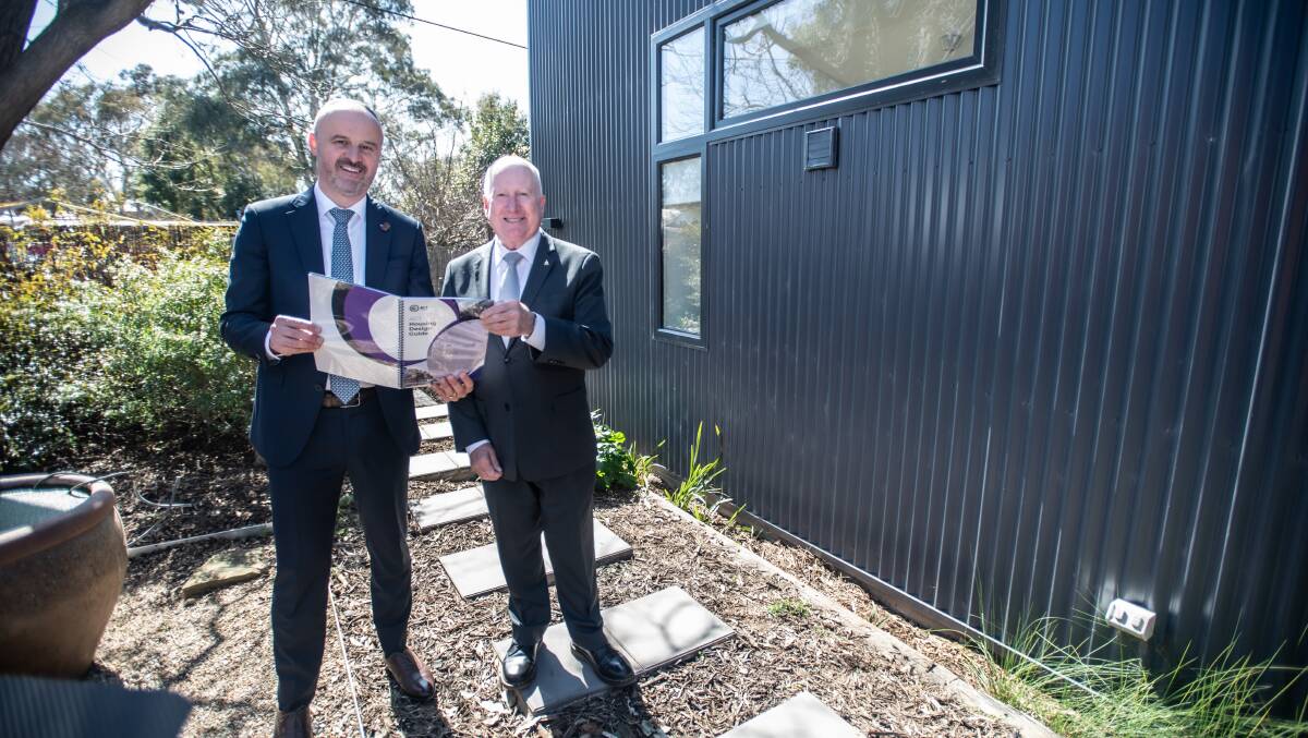 Chief Minister Andrew Barr and Planning Minister Mick Gentleman with the new Territory Plan. Picture by Karleen Minney