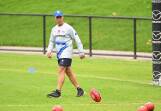 North Melbourne coach Alastair Clarkson faces a challenge against his former club Hawthorn. (James Ross/AAP PHOTOS)