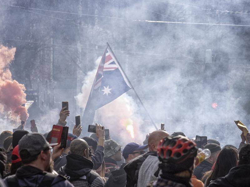 Thousands of people defied stay-at-home orders to protest restrictions in Sydney and Melbourne.