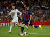 Robert Lewandowski scored his first goal for Barcelona during the friendly win over Pumas UNAM. (AP PHOTO)