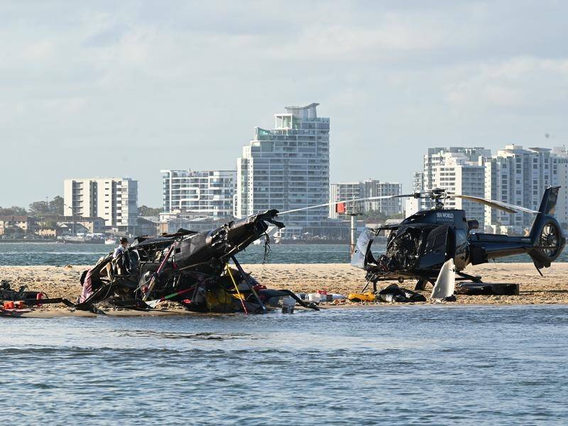 A final report into the mid-air crash between two helicopters is not expected before September 2024. (Dave Hunt/AAP PHOTOS)