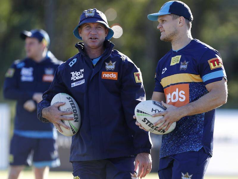 Dale Copley (r) has a chat with Luke Burt, one of the interim coaches, at Titans training.