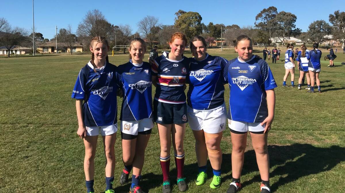 Friends again: Emma Barclay, Louise Story, Claire Petit, Sarah Walker and Krystal Bridgeford. Four played for Royals, Claire played for Trinity. Photo: Georgeanna Story. 