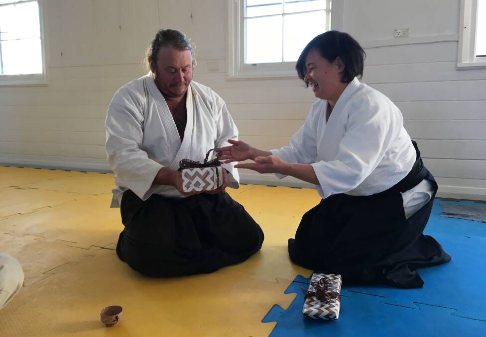 Learning: Matthew Hulse teaching the sacred geometry of Aikido. Photos: supplied.