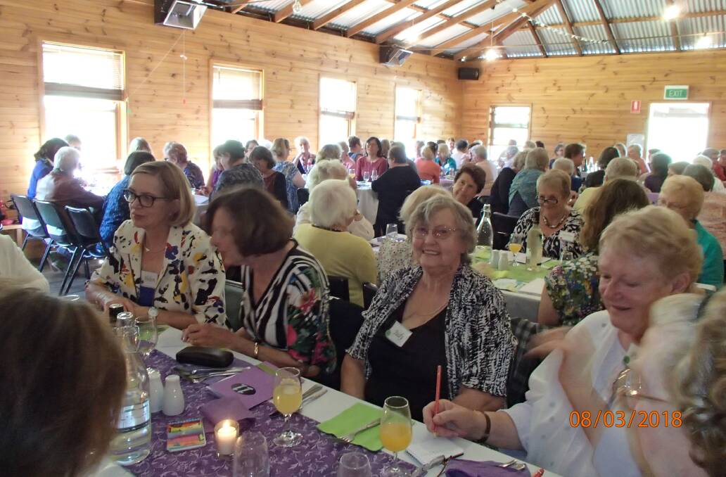 Women enjoy lunch at the Gundillion Hall. Photo: supplied.