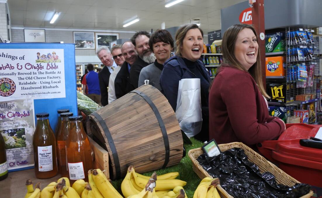 BARREL OF LAUGHS: Business people start the QPRC initiative 'Shop Local' this week. Photo: Elspeth Kernebone