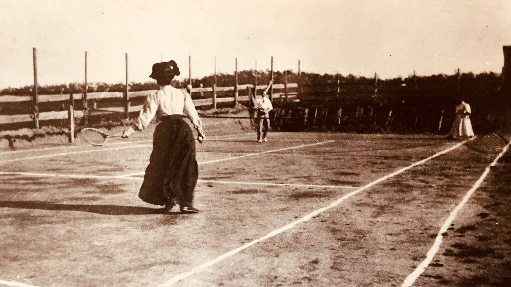 HISTORIC HIT: Taken in 1903 in Braidwood, the player in the foreground of this historic photo is believed to be one Mrs Holt, wife of the local Dr Holt. Photo: supplied.