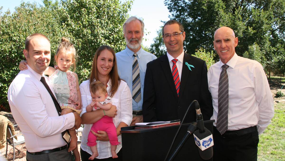 The announcement was made in Bungendore at the Home of Palerang Councillor Garth Morrison and his wife Charlotte, pictured here with Beatrice and Elodie, Palerang Mayor Pete Harrison, Minister Stephen Conroy and NBN Co’s Mike Quigley.