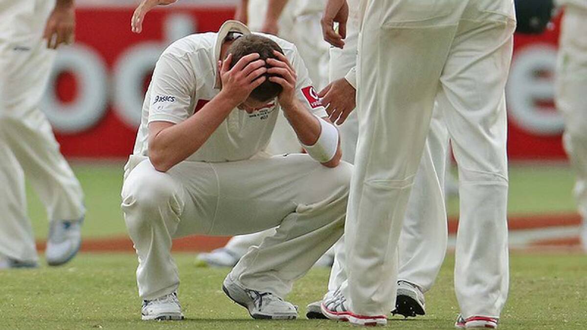 An exhausted Peter Siddle reacts at the end of play. He bowled 33 overs, taking 4/65, to give Australia a chance at victory. Photo: Getty Images