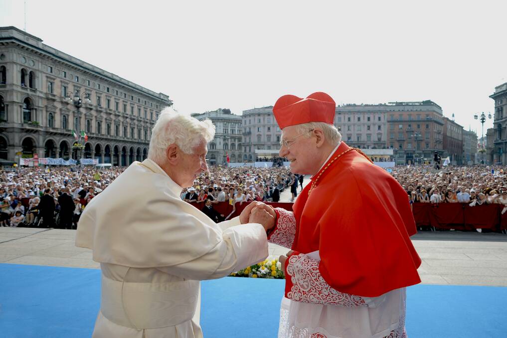 6. Archbishop Angelo Scola of Italy (right).