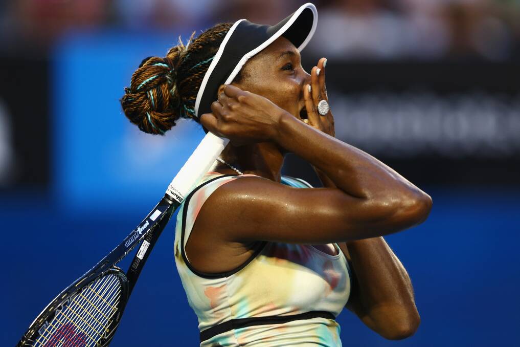 Venus Williams of the United States reacts after losing a point in her second round match against Alize Cornet of France. Photo by Mark Kolbe/Getty Images