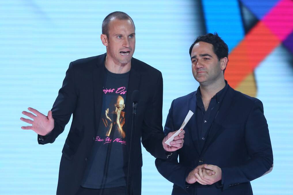 Ryan 'Fitzy' Fitzgerald and Michael 'Wippa' Wipfli present the ARIA for best International Artist at the 26th Annual ARIA Awards 2012. Photo by Brendon Thorne/Getty Images