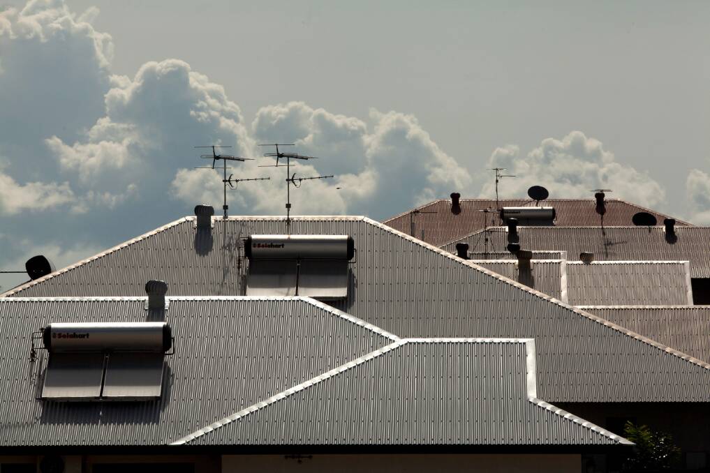 Modern housing in the Darwin suburb of Farrar, all tin roofs and solar panels. Photo Glenn Campbell