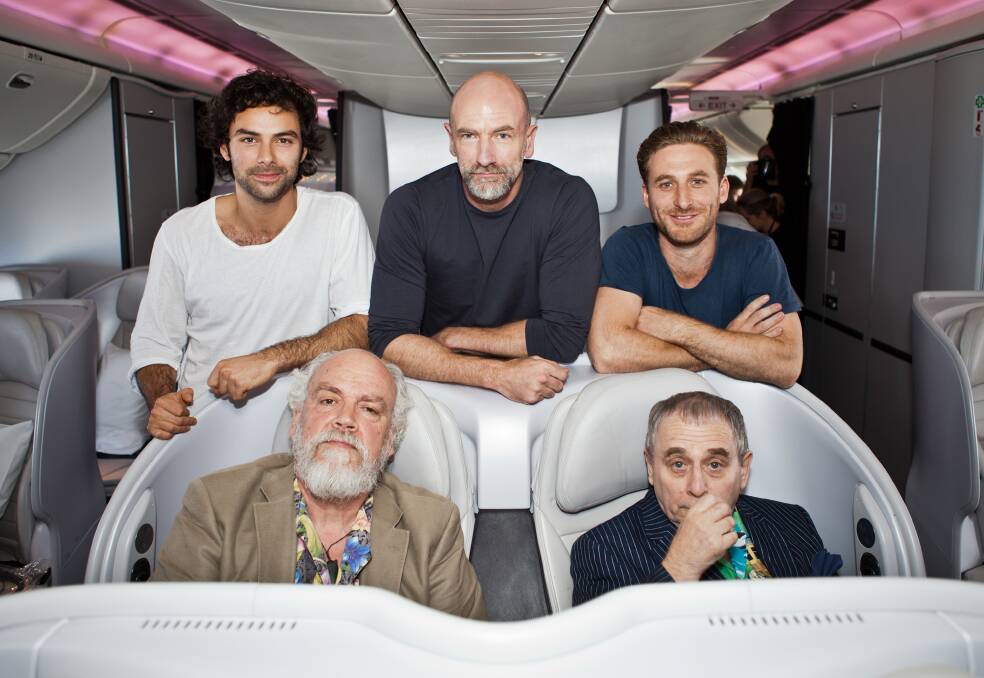 The cast and crew of 'The Hobbit: An Unexpected Journey', onboard an Air New Zealand Hobbit-inspired 777-300 in Wellington, New Zealand. Photo by Laura Forest/Air New Zealand via Getty Images