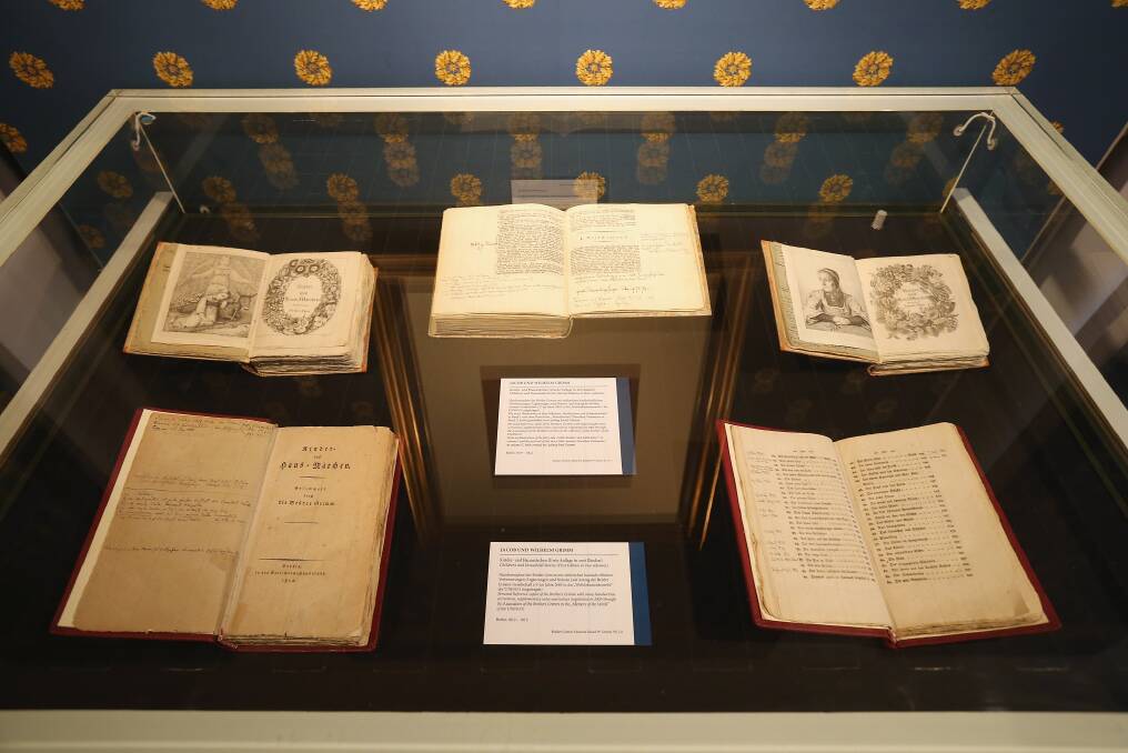 First and second-edition books of Grimms' Fairy Tales lie in a display at the Grimm Brothers Museum in Kassel, Germany. Photo by Sean Gallup/Getty Images
