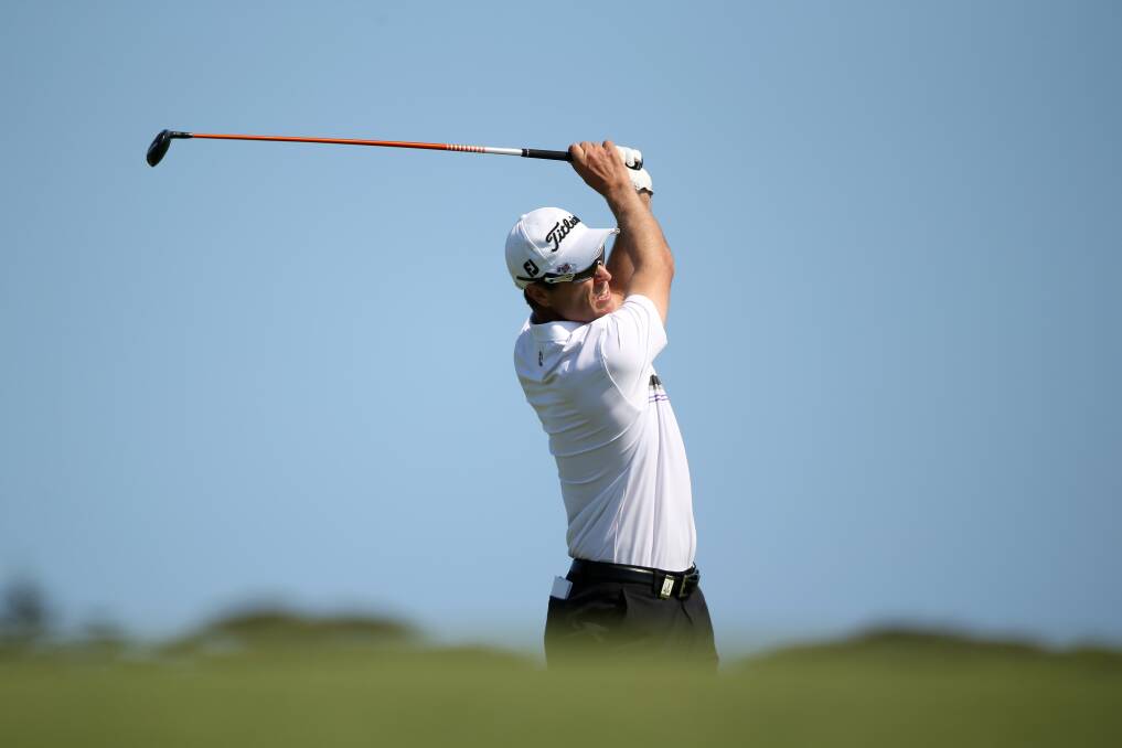 Paul Sheehan of Australia plays a shot during round one of the 2012 Australian Open at The Lakes Golf Club in Sydney, Australia. Photo by Mark Metcalfe/Getty Images