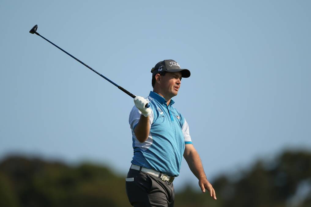 Greg Chalmers of Australia reacts after a shot during round one of the 2012 Australian Open at The Lakes Golf Club in Sydney, Australia. Photo by Mark Metcalfe/Getty Images