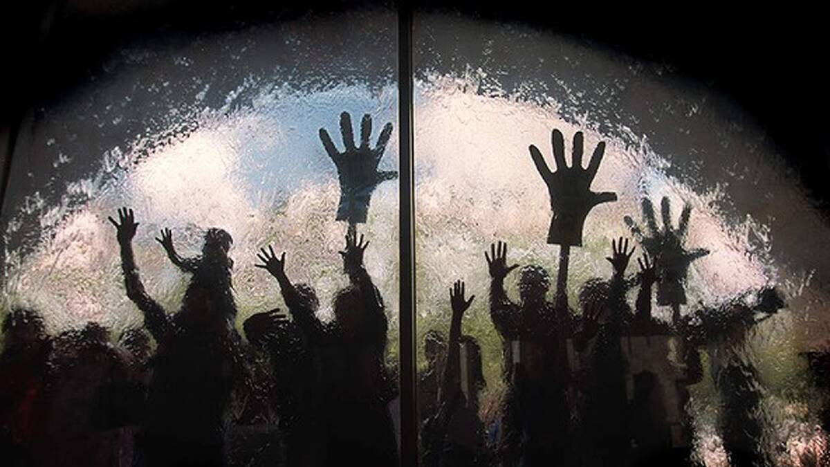 "Hands off our National Gallery" was the chant as protestors placed their hands on the water wall as a symbolic gesture of their anger over changes to the gallery on March 21, 1997. Photo: Simon O Dwyer