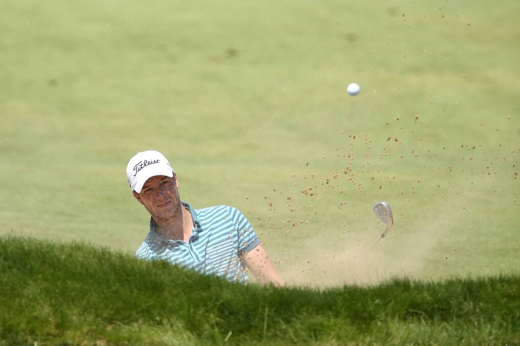 Steven Jones of Australia plays a shot during round one of the 2012 Australian Open at The Lakes Golf Club in Sydney, Australia. Photo by Mark Metcalfe/Getty Images