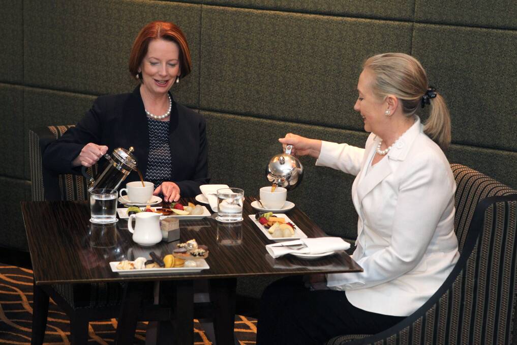 The Prime Minister of Australia Julia Gillard and the US Secretary of State Hillary Clinton enjoy afternoon tea during the annual Australia-United States Ministerial Consultations at the Hyatt Hotel in Perth, Australia. Photo by Colin Murty-Pool/Getty Images