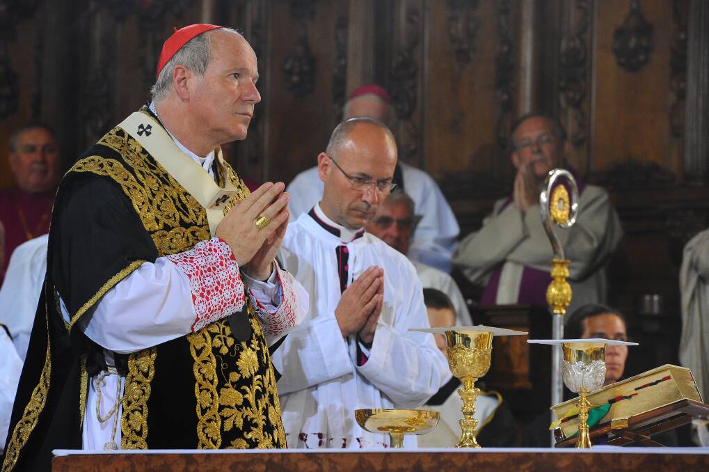 Cardinal Christoph Schonborn of Austria (left).