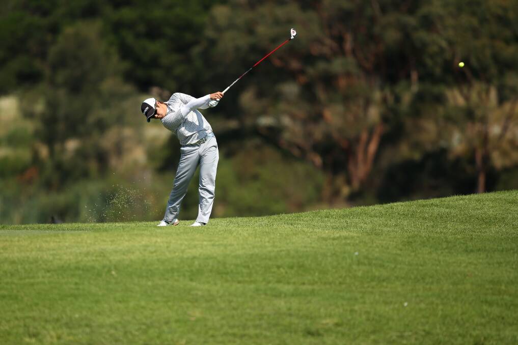 Zhi Jun Ou of China plays a shot during round one of the 2012 Australian Open at The Lakes Golf Club in Sydney, Australia. Photo by Mark Metcalfe/Getty Images