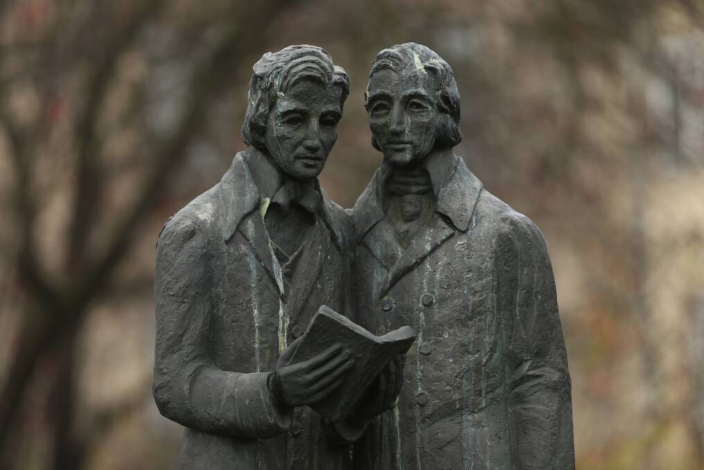 A memorial showing brothers Jacob and Wilhelm Grimm, authors of Grimms' Fairy Tales, stands in a small park on November 20, 2012 in Kassel, Germany. Photo by Sean Gallup/Getty Images