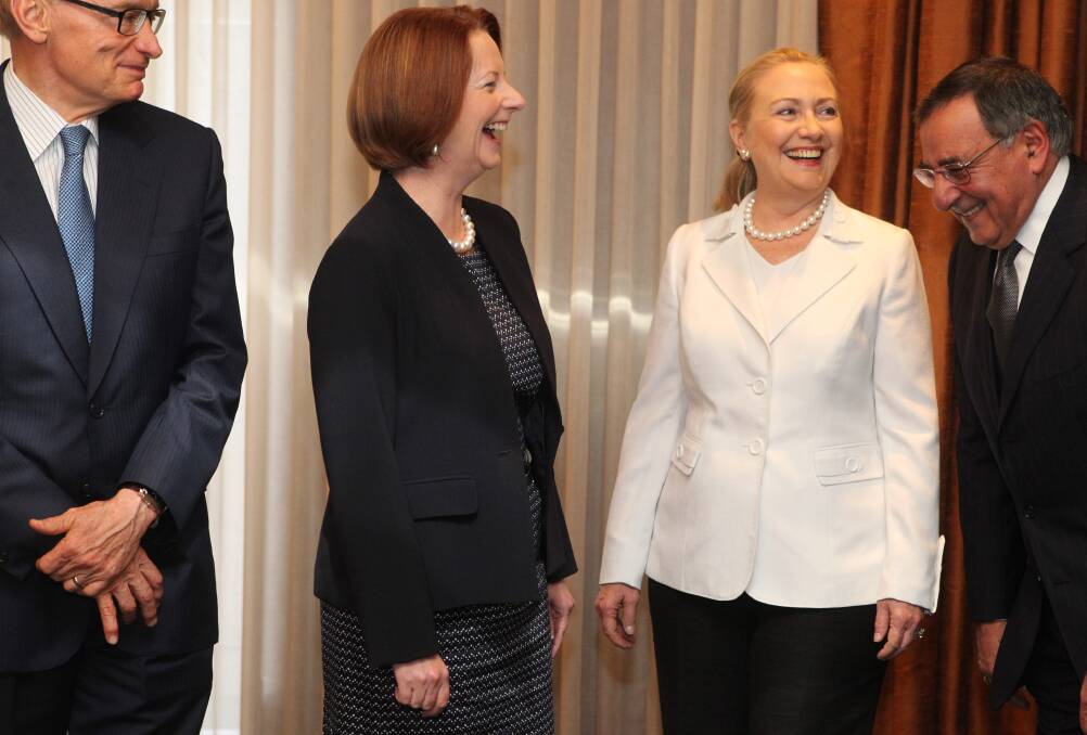Australian Minister for Foreign Affairs Bob Carr, Australian Prime Minister Julia Gillard, US Secretary of State Hillary Clinton and US Secretary of Defense Leon Panetta share a joke during the annual Australia-United States Ministerial Consultations at the Hyatt Hotel in Perth, Australia. Photo by Colin Murty - Pool Getty Images