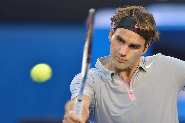 Roger Federer against Nikolay Davydenko on Rod Laver Arena. Photo: Joe Armao