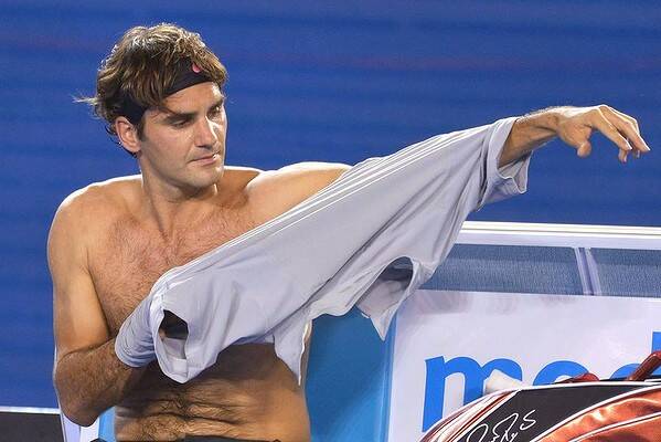 Roger Federer shirt swap on Rod Laver Arena. Photo: Joe Armao